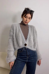 Strickjacken mit einem Knopf und offener Vorderseite